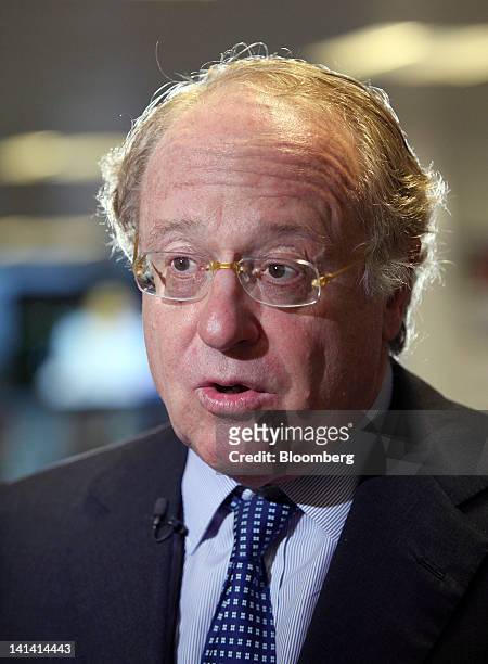Paolo Scaroni, chief executive officer of ENI SpA, speaks during a television interview prior to a presentation of the company's 2012-2015 strategies...