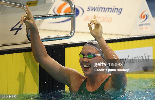 Kylie Palmer of Australia celebrates winning the Women's 400 Metre Freestyle Final during day two of the Australian Olympic Swimming Trials at the...
