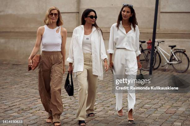 Guest posing outside Lovechild 1979 show during Copenhagen Fashion Week Spring/Summer 2023 on August 09, 2022 in Copenhagen, Denmark.