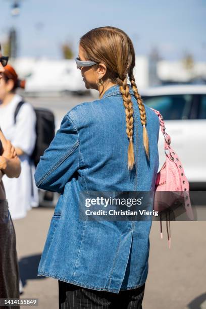 Trine Kjaer with pigtails seen wearing denim jacket outside Stine Goya during Copenhagen Fashion Week Spring/Summer 2023 on August 10, 2022 in...