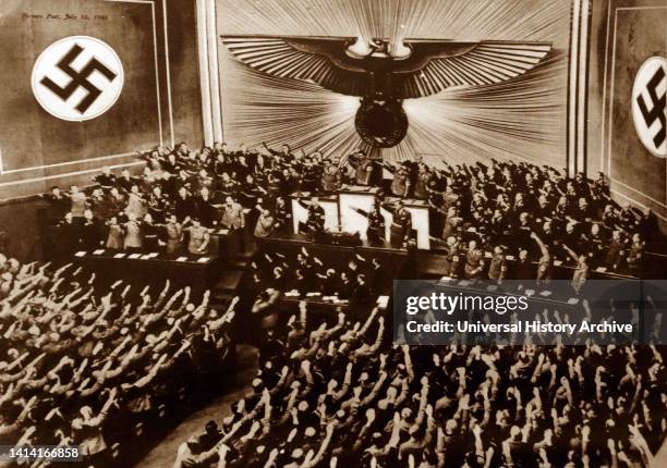 The German Parliament. Adolf Hitler takes the Nazi salute.