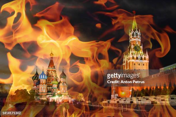 red square, moscow kremlin on the background of a flame. - kremlin imagens e fotografias de stock