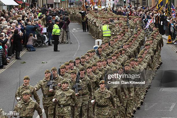 Soldiers from the 3rd Battalion the Yorkshire Regiment march during a pre-deployment parade on March 16, 2012 in Warminster, England. The parade will...