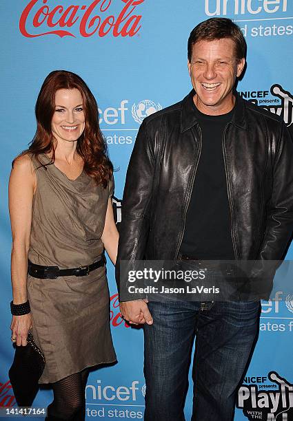 Actress Laura Leighton and actor Doug Savant attend the UNICEF "Playlist With The A-List" celebrity karaoke benefit at El Rey Theatre on March 15,...