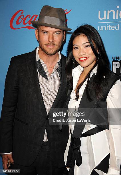 Singer Matt Goss and actress Catherine An attend the UNICEF "Playlist With The A-List" celebrity karaoke benefit at El Rey Theatre on March 15, 2012...