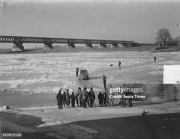 Culemborg autos drive over Lek River, February 4, 1954.