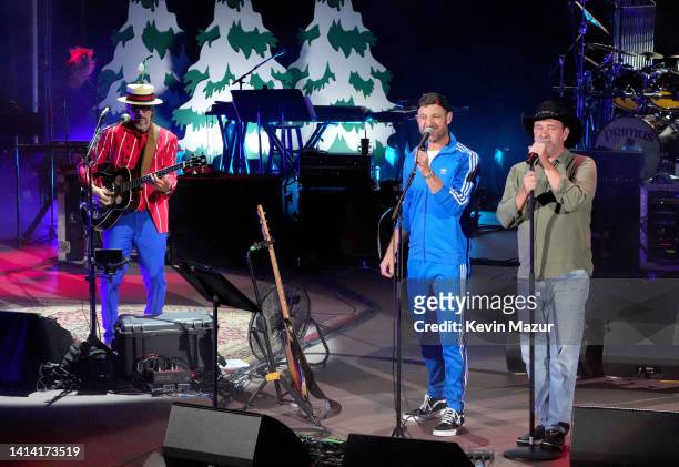 Les Claypool of the band Primus, Matt Stone, and Trey Parker perform during South Park The 25th Anniversary Concert at Red Rocks Amphitheatre on...