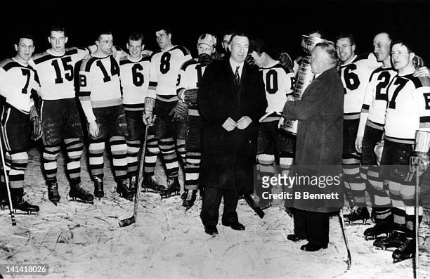 The Boston Bruins are presented the Stanley Cup Trophy after defeating the Toronto Maple Leafs in Game 5 of the 1939 Stanley Cup Finals on April 16,...