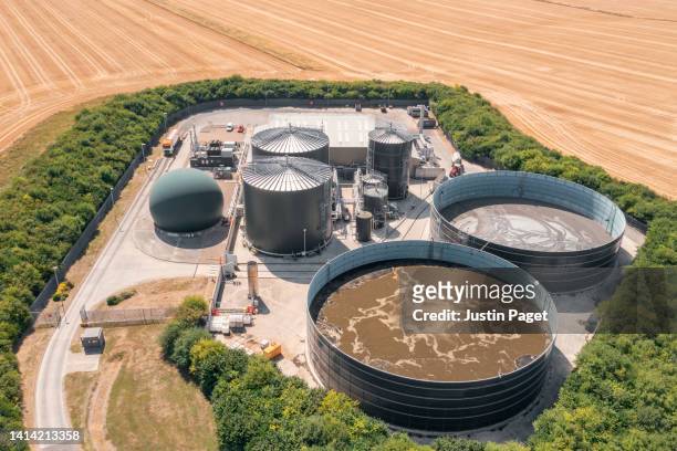 drone view of a food recycling centre where food waste is turned into renewable energy - biomass - renewable energy source - biomass renewable energy source stockfoto's en -beelden