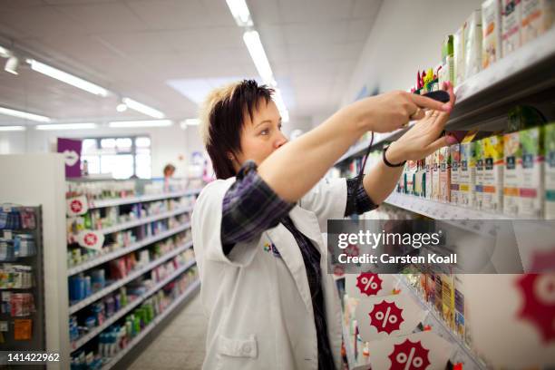 Branch manager reorders goods using a electronic scanner at a Schlecker drugstore on March 16, 2012 in Strausberg, Germany. The German drugstore...