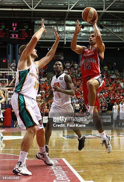 Kevin Lisch of the Wildcats drives to the basket during the round 24 NBL match between the Perth Wildcats and the Townsville Crocodiles at Challenge...