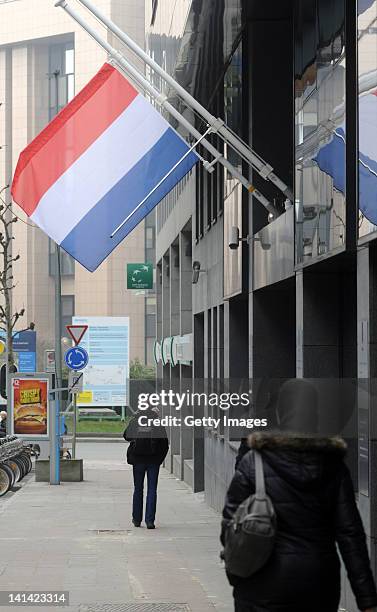 The Dutch national flag flies at half mast outside their embassy following a coach crash which killed 28 people March 16, 2012 in Brussels, Belgium....