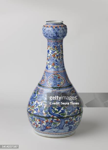 Pear-shaped bottle vase with bamboo, prunus, pine and birds in a landscape, Pear-shaped vase of porcelain with thickening modeled in lotus leaves at...