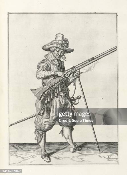 Soldier on guard pressing his fuse on the cock of his musket , c. 1600, A soldier on guard, full-length, to the right, holding a musket with his left...