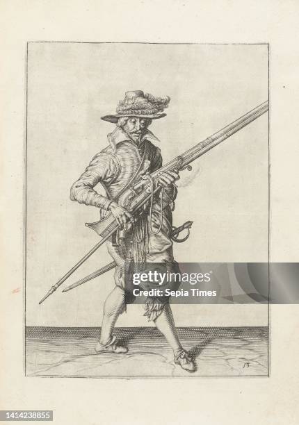 Soldier holding his musket with his left hand pointed diagonally upward, while pulling his furket from under the barrel , c. 1600, A soldier,...