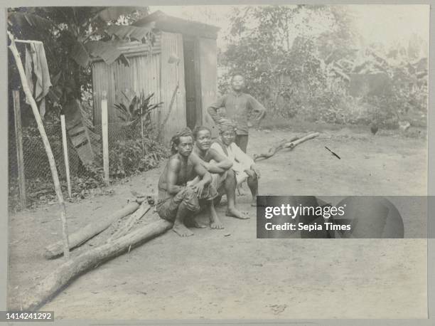 Javanese , Four Javanese contract workers. Part of the photo album Souvenir de Voyage , about the life of the Doijer family in and around the...