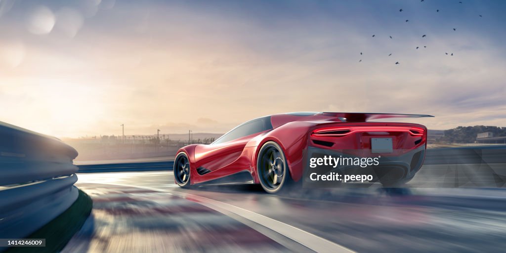 Generic Red Electric Sports Car Driving Fast Around Corner On Wet Racetrack