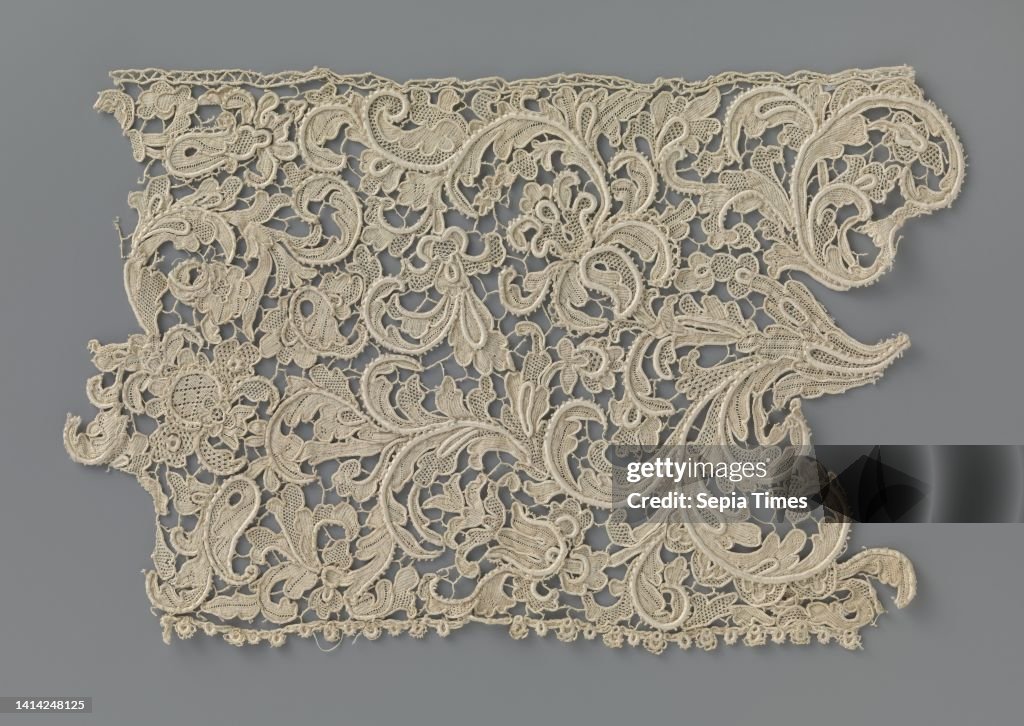 Strip of needlepoint lace with asymmetrical acanthus leaves