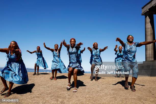 Rwandan woman drummers perform during the photocall for "The Book of Life" at the Edinburgh International Festival on August 11, 2022 in Edinburgh,...