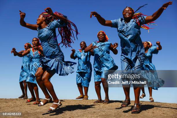 Rwandan woman drummers perform during the photocall for "The Book of Life" at the Edinburgh International Festival on August 11, 2022 in Edinburgh,...