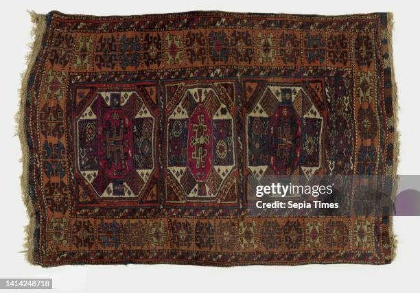 Bedding, YURUK-NOMADENKLEED, Bedding, Yuruk-Nomad rug. Center field: three reclining rectangles with white hexagons in dark orange are separated and...