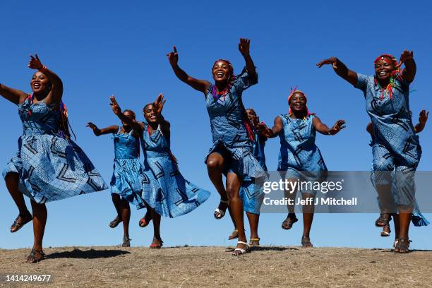 Rwandan woman drummers perform during the photocall for "The Book of Life" at the Edinburgh International Festival on August 11, 2022 in Edinburgh,...