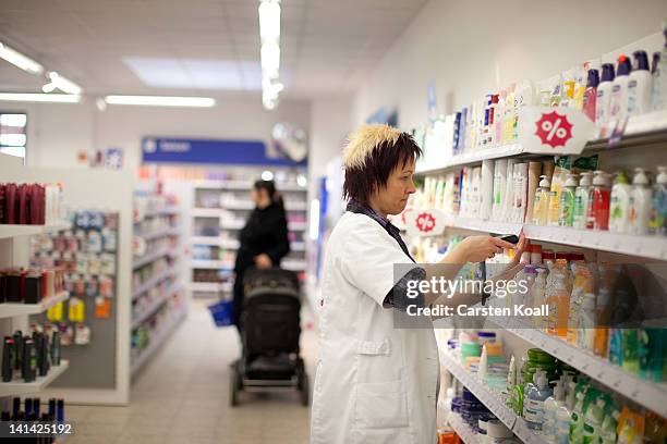 Branch manager reorders goods using a electronic scanner at a Schlecker drugstore on March 16, 2012 in Strausberg, Germany. The German drugstore...