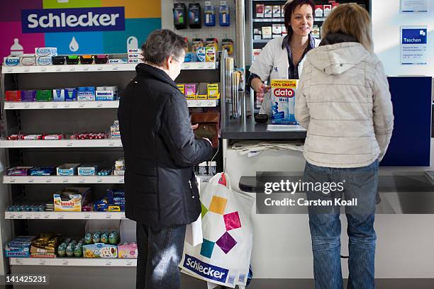 Branch manager collected from customers at a Schlecker drugstore on March 16, 2012 in Strausberg, Germany. The German drugstore chain released a list...