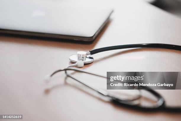 a doctor's stethoscope on his table - generic drug stock pictures, royalty-free photos & images
