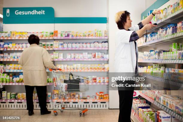 Branch manager reorders goods using a electronic scanner at a Schlecker drugstore on March 16, 2012 in Strausberg, Germany. The German drugstore...