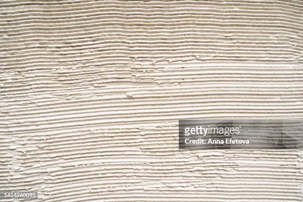 textured smear of white decorative plaster. macro photography - alabaster stockfoto's en -beelden