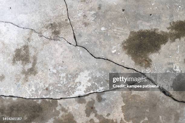 cracks in the floor concrete - collapsing wall stock pictures, royalty-free photos & images