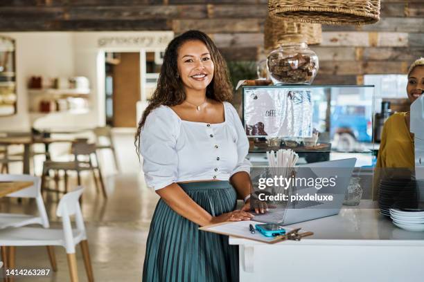 Cafe Owner With Laptop Checking Searching And Preparing Pricing Menu On Technology For A Local Coffee Shop Portrait Of Smiling And Confident Restaurant Entrepreneur Managing Staff And Online Orders, Stockfoto