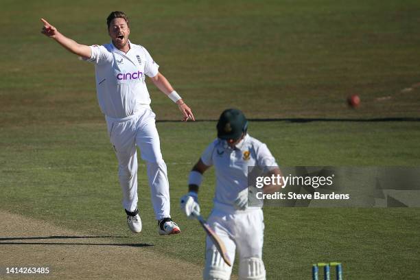 Ollie Robinson of England Lions celebrates taking the wicket of Sarel Erwee of South Africa caught by Sam Billings during day three of the tour match...