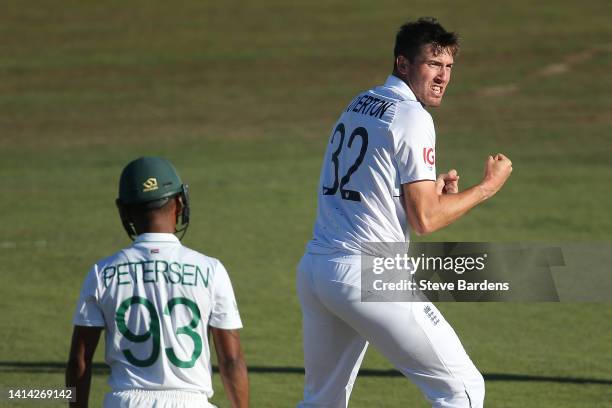 Craig Overton of England Lions celebrates taking the wicket of Keegan Petersen of South Africa lbw during day three of the tour match between England...