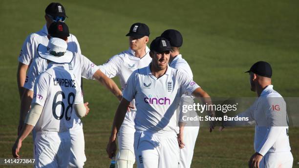 Craig Overton of England Lions shakes hands with his team mates at the end of play during day three of the tour match between England Lions and South...