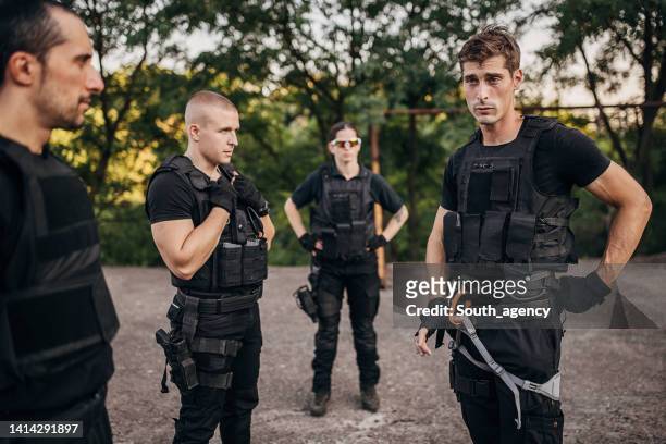 special forces training grounds - bullet proof vest stock pictures, royalty-free photos & images