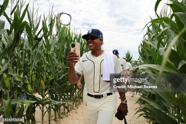 Marcus Stroman of the Chicago Cubs walks through the corn stalks prior to the game against the Cincinnati Reds at Field of Dreams on August 11, 2022...