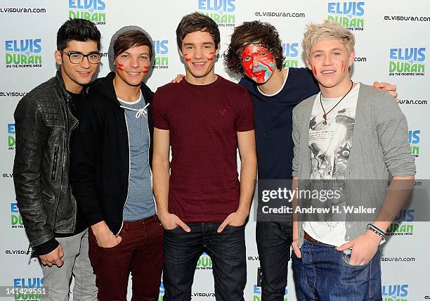 One Direction band members Zayn Malik, Louis Tomlinson, Liam Payne, Harry Styles and Niall Horan visit "The Elvis Duran Z100 Morning Show" at Z100...
