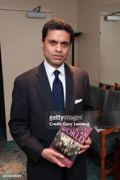 During the Aloud series at the Los Angeles Central Library political journalist Fareed Zakaria poses for a portrait with his book The Post-American...