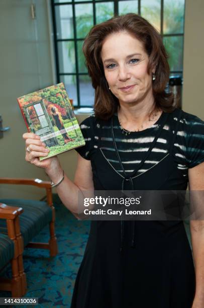 During the Aloud series at the Los Angeles Central Library Actress Debra Winger poses for a portrait with her book Undiscovered on June 18, 2008 in...
