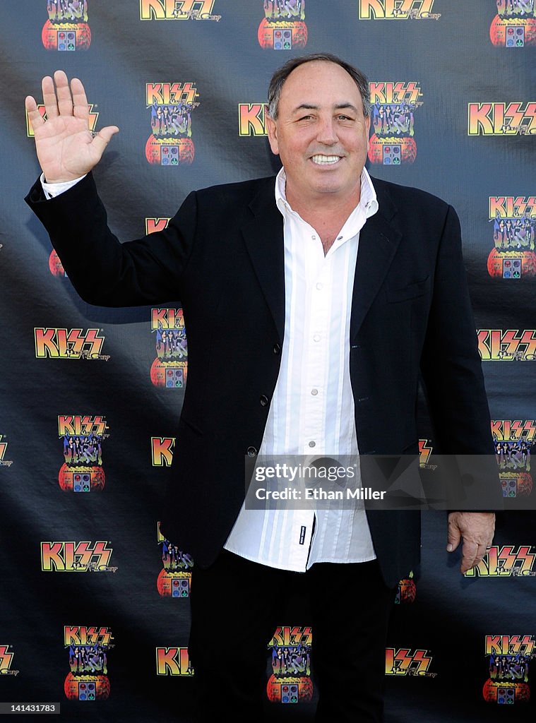 Kiss manager Doc McGhee arrive at the grand opening of the KISS by