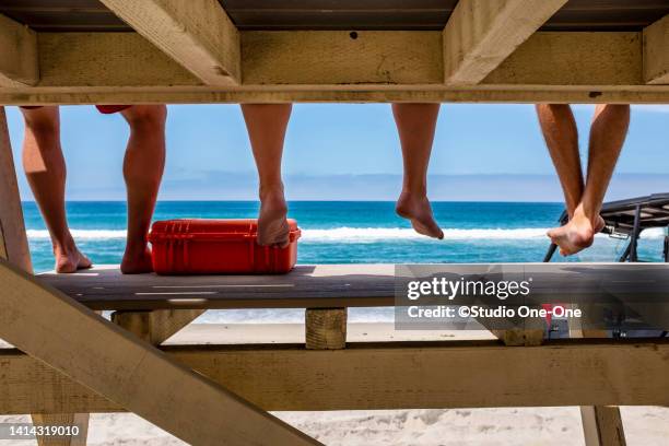 lifeguard legs - surf rescue stock pictures, royalty-free photos & images