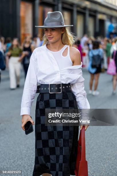 Guest is seen outside Baum & Pferdgarten during Copenhagen Fashion Week Spring/Summer 2023 on August 10, 2022 in Copenhagen, Denmark.