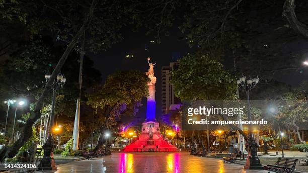 guayaquil's monument colored with light for august 10th at guayaquil's downtown, guayas province, ecuador, south america. - guayaquil stock pictures, royalty-free photos & images