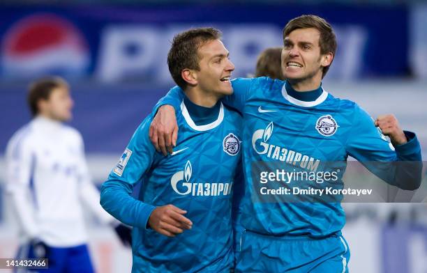 Domenico Criscito and Nicolas Lombaerts of FC Zenit St. Petersburg celebrate after scoring a goal during the Russian Football League Championship...