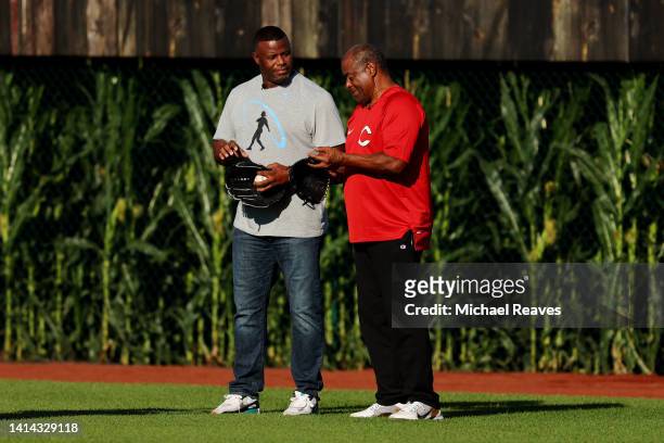 Former baseball player Ken Griffey Jr. And his father Ken Griffey Sr. Take the field before the game between the Chicago Cubs and the Cincinnati Reds...