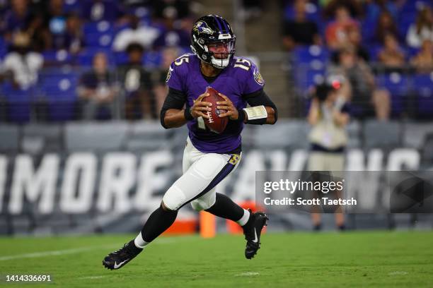 Brett Hundley of the Baltimore Ravens scrambles against the Tennessee Titans during the second half at M&T Bank Stadium on August 11, 2022 in...