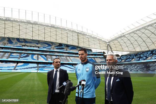 Jack Rodwell speaks to the media alongside Sydney FC Adam Santo and Sydney FC head coach Steve Corica during a media opportunity after signing with...
