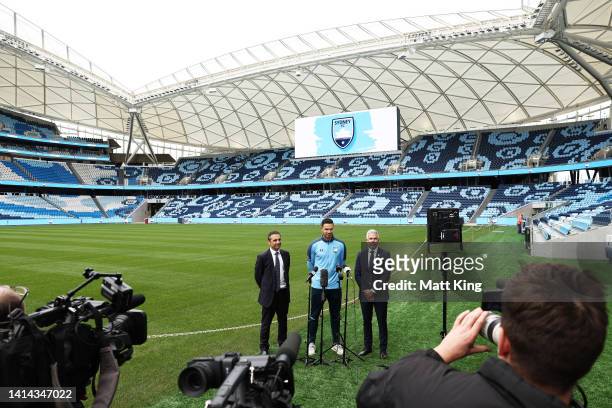 Jack Rodwell speaks to the media alongside Sydney FC Adam Santo and Sydney FC head coach Steve Corica during a media opportunity after signing with...
